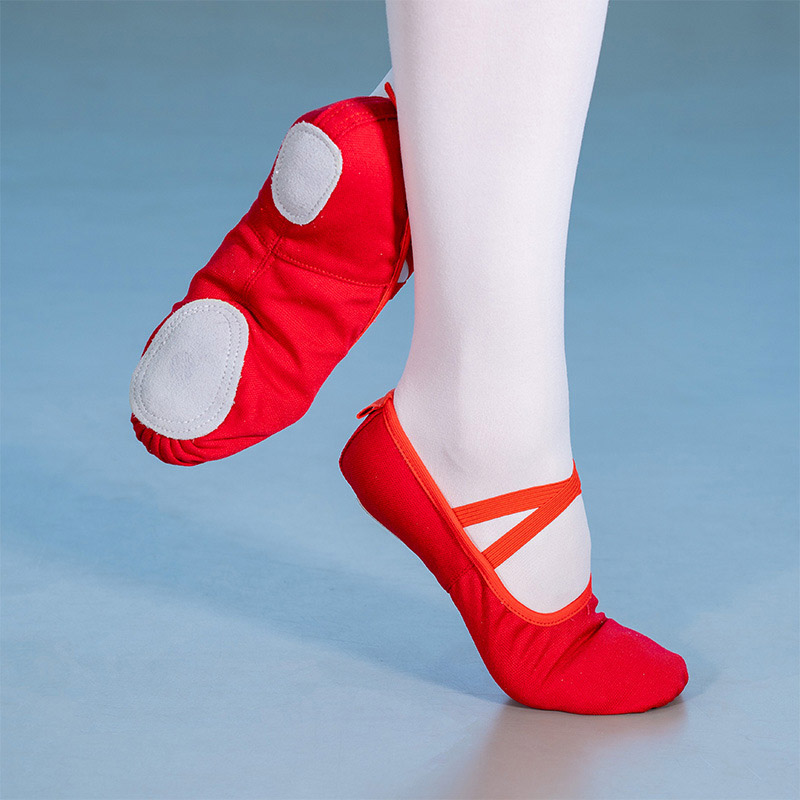 red ballet slippers with ribbons