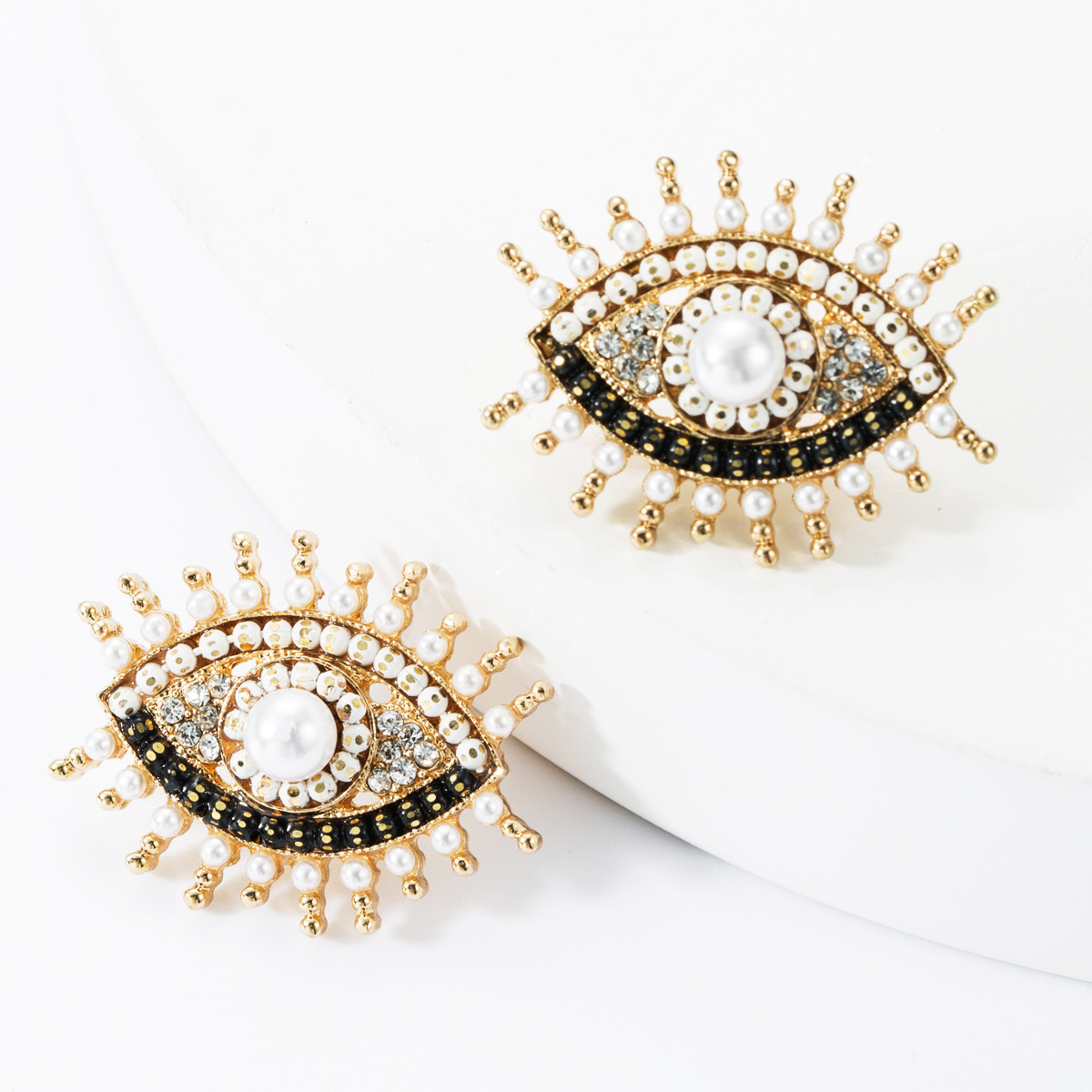 

Personalized Web celebrity S925 silver needle alloy Diamond rhinestone acrylic Pearl eye earrings minority earrings