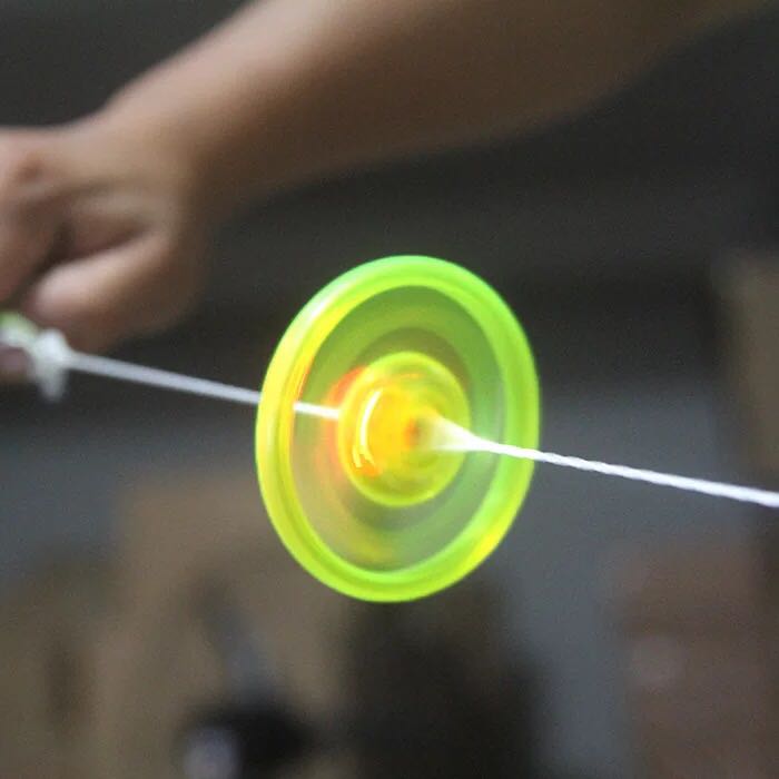 

Hot sale Flash Pull Line Led Flywheel LED Fire Wheel Glow Flywheel Whistle Creative Classic LED toys for Children Gift