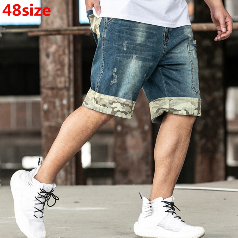 

Summer new men's large size denim shorts stitching male large size knee length straight denim shorts 130kg, Blue