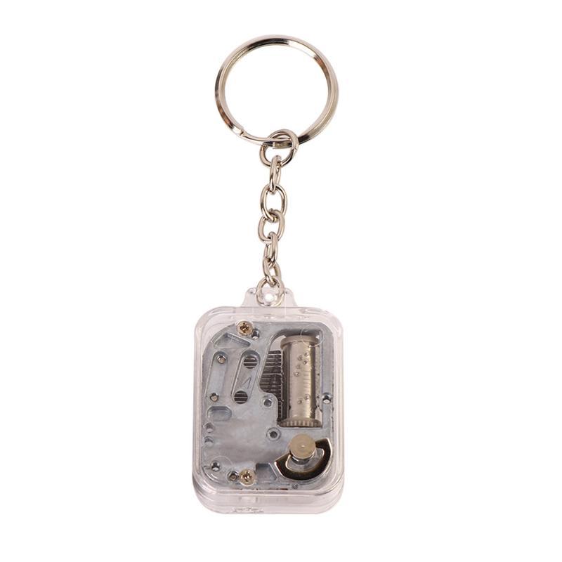 

Kids DIY Music Box Keychain Handy Crank Movement Musical Birthday Gifts Toy Musical Instrument Melody Key Ring Gifts