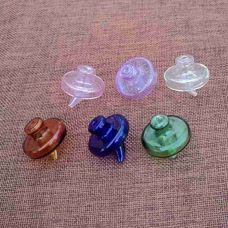 

Wholesale Hot Cute Carb Caps Multicolor Mini UFO Dab Rigs Spinning Top Glass Smoking Accessories For Water Pipes Bong Accessories DCC03