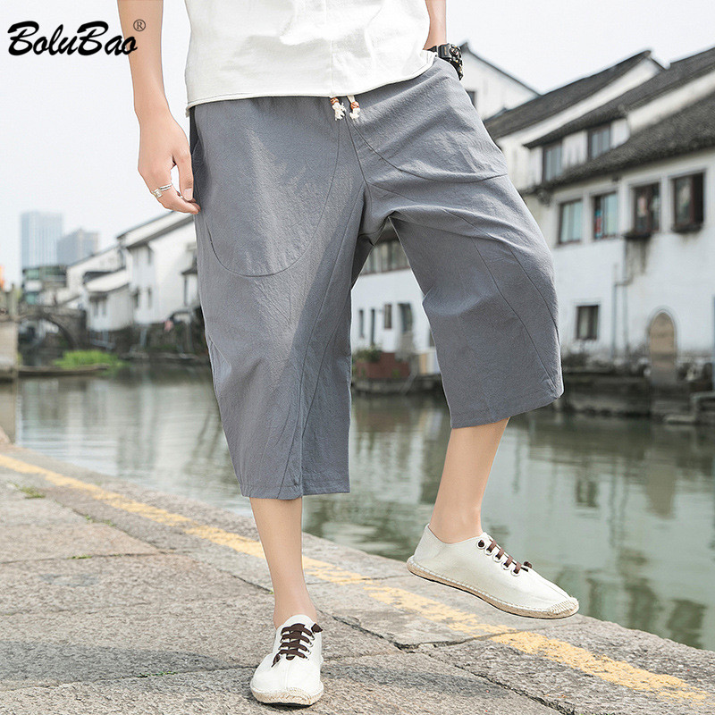 

BOLUBAO Brand Men Straight Shorts Men's Street Fashion Wide Leg Knee Length Pants Summer New Simple Loose Casual Shorts Male, Black