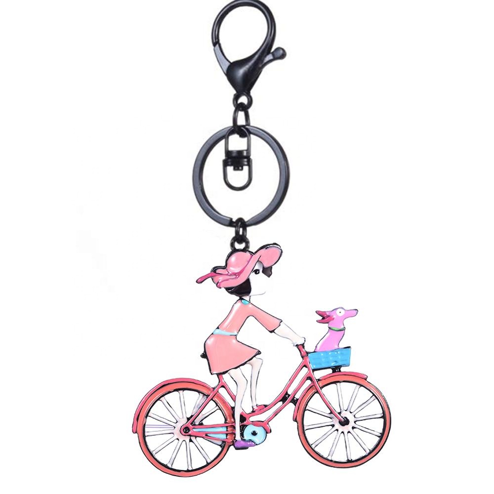 muñeca anda en bicicleta