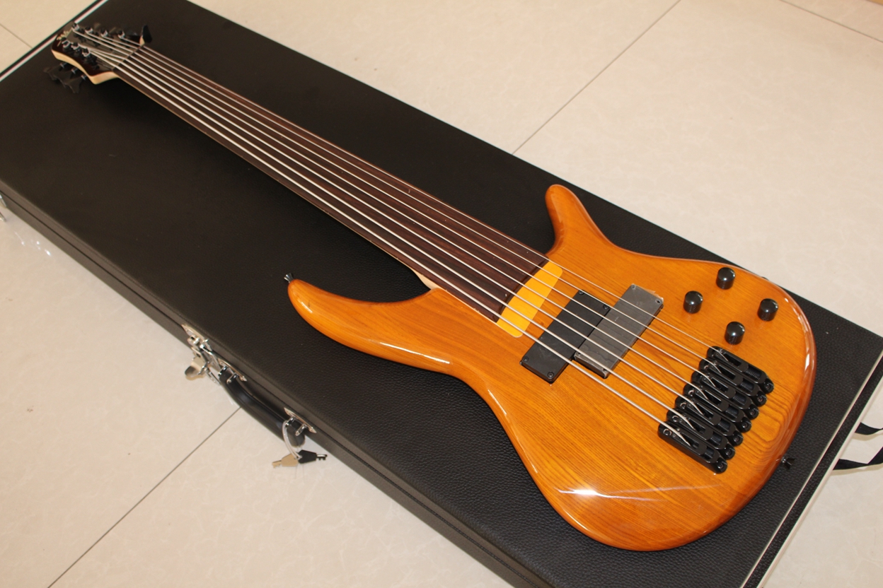 

Rare 7 string bass natural fretless electric bass guitar Chinese guitar