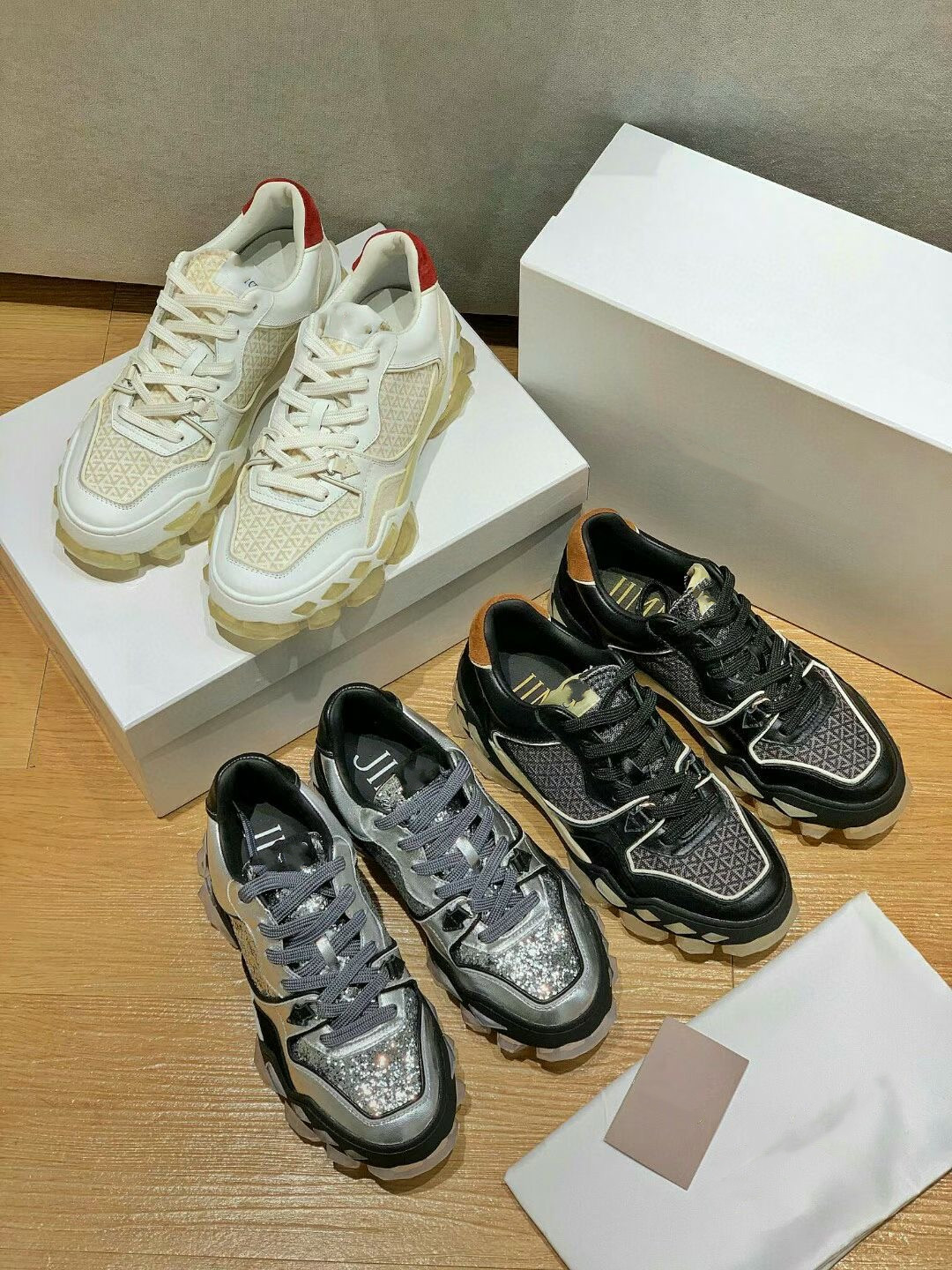 

The new pre-fall Daddy shoes for men and women are platform height trainers white black grey