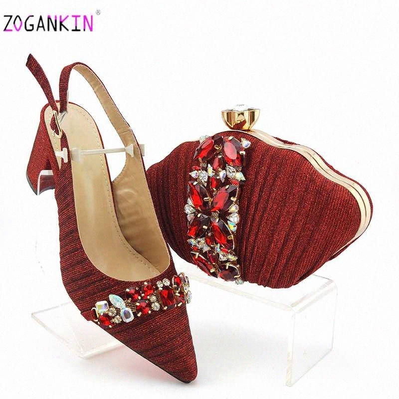 red shoes and matching clutch bag