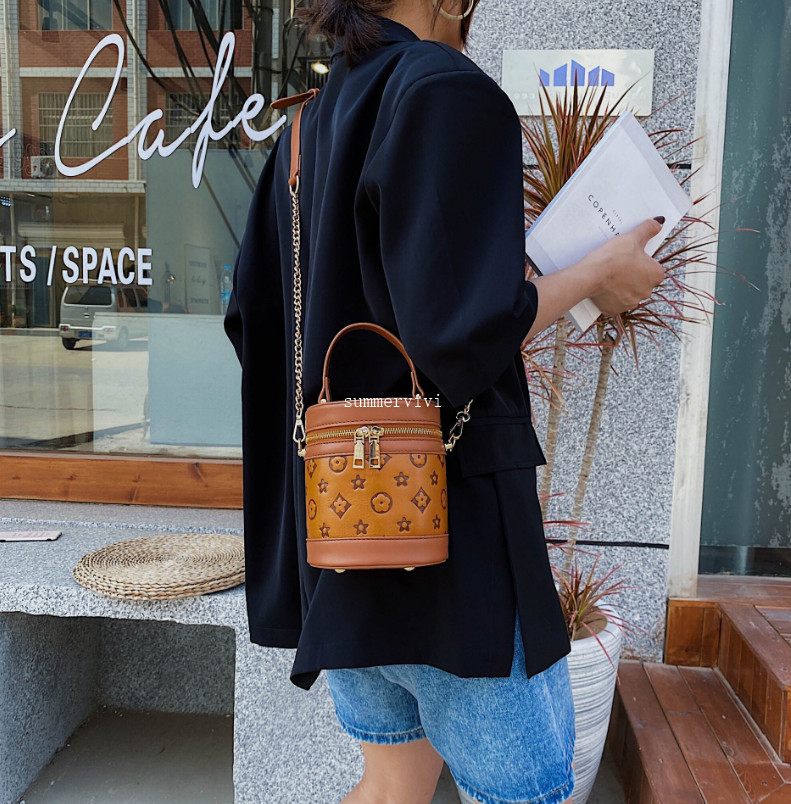 

Fashion new Kids chain handbags Designer girls PU lether one shoulder bags women mini Cosmetic bag A3931, Brown