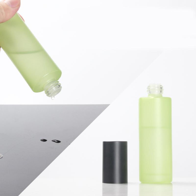 

80ml Green/Blue/White/Clear Glass Skin Care Bottle with Matte Black Cap
