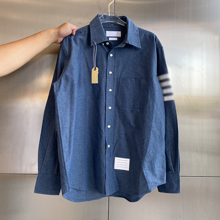 

Men's and women's fashion TB denim blue casual four-bar shirt