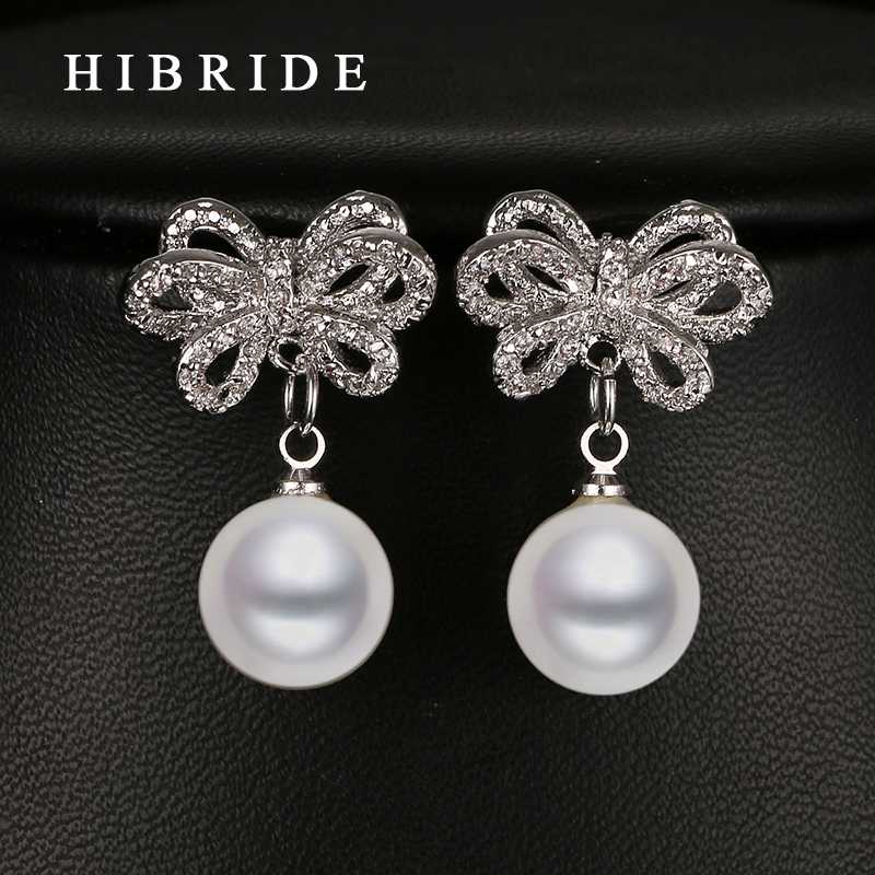

HIBRIDE Fashion Pearl Earrings For Women CZ Micro Insert Flower Shape Gold Color Pearl Pendant Earrings For Ladies Gifts E-15