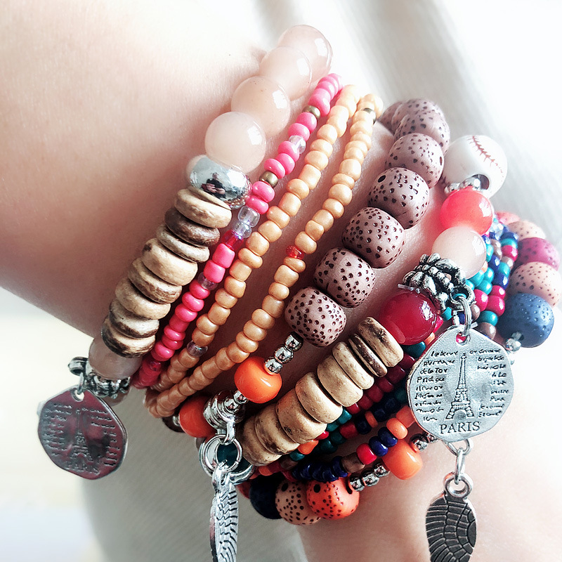

Bohemia Ethnic Colorful Wooden Beaded Bracelets For Women Fashion Carved Feather Pendant Elastic Adjustable Bracelet Set Jewelry