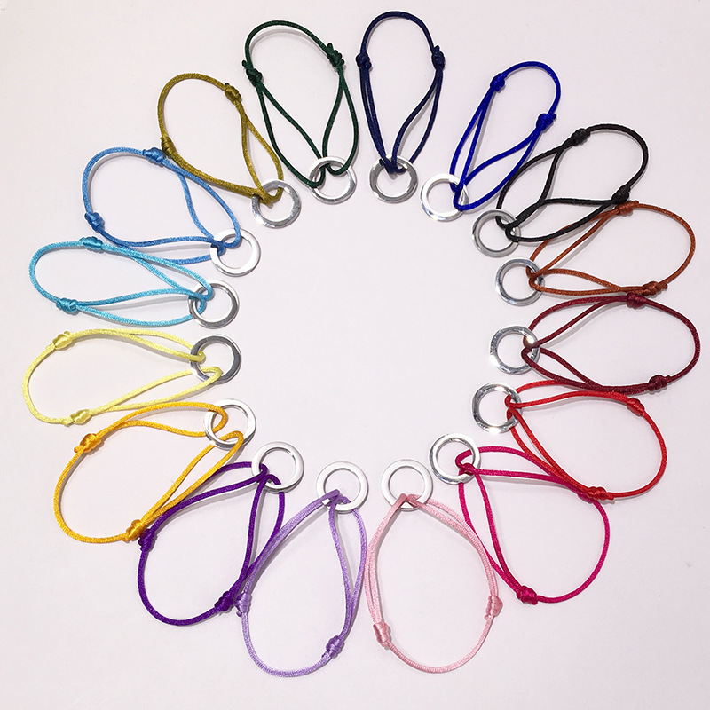 

High quality brand name couple bracelets for women fashion jewelry Beautiful hot titanium steel round color hand rope 16 colors
