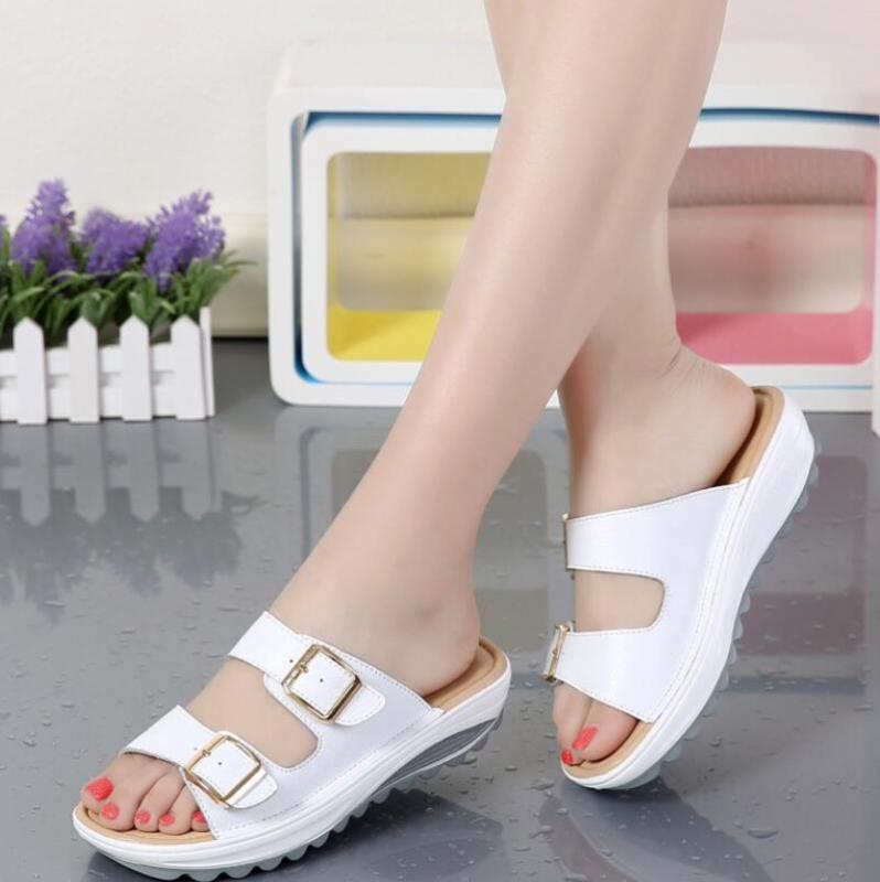 

Sandals and slippers female summer students Korean version of the word sponge cake slope with outer wear wild thick bottom n44