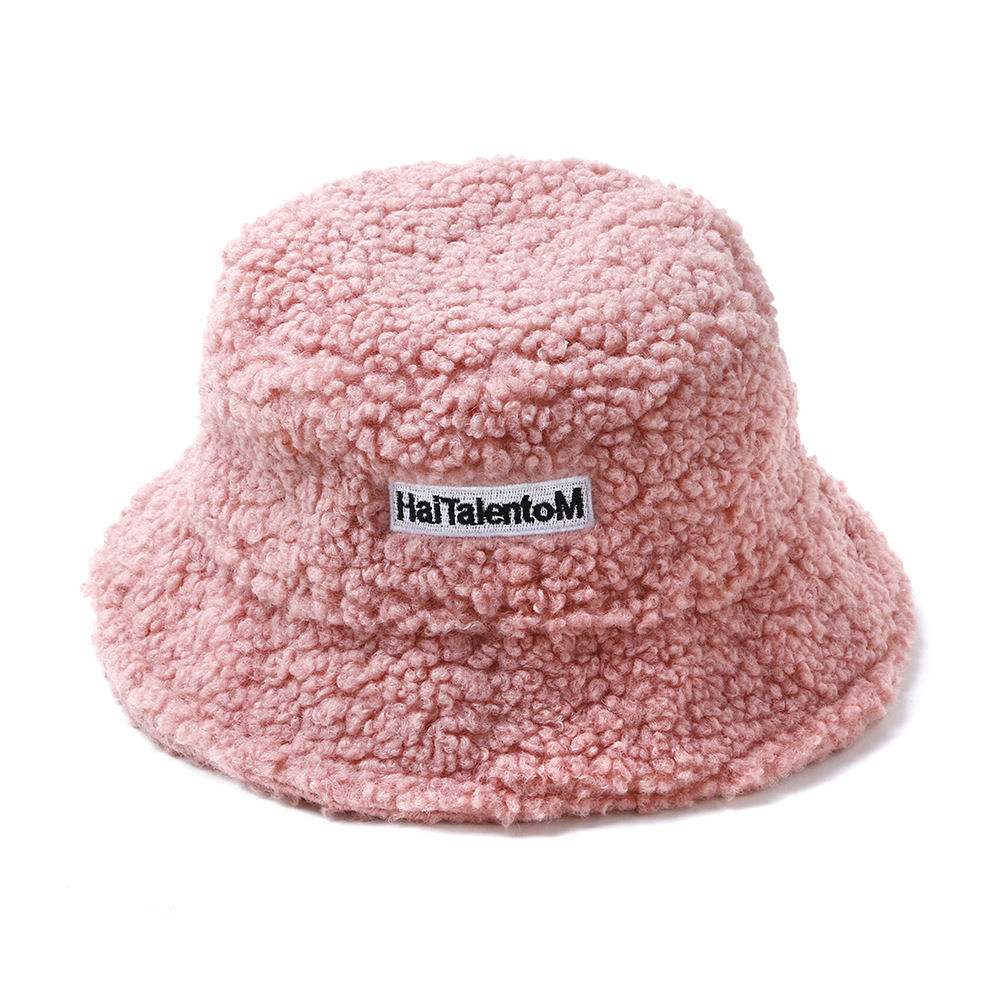 

Korean version of Joker lamb wool fisherman Hat female Autumn winter Star the same style female Day basin earguard hat