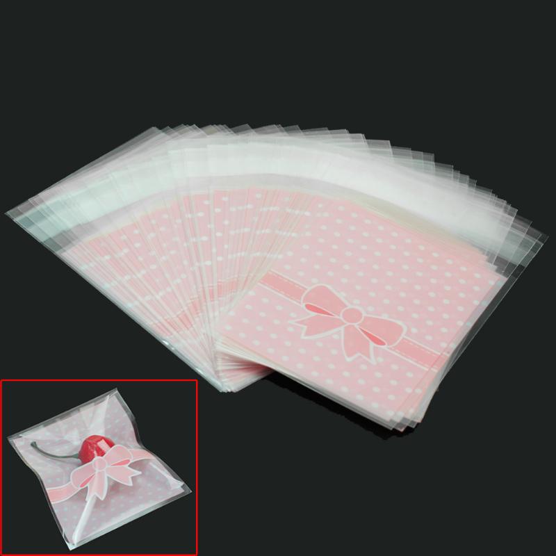 

50pcs Self Adhesive Sealing OPP Plastic Cute Dot Bowknot Design Cake Candy Gift Packaging Bags Wedding Party Favour 9.5*7.9cm