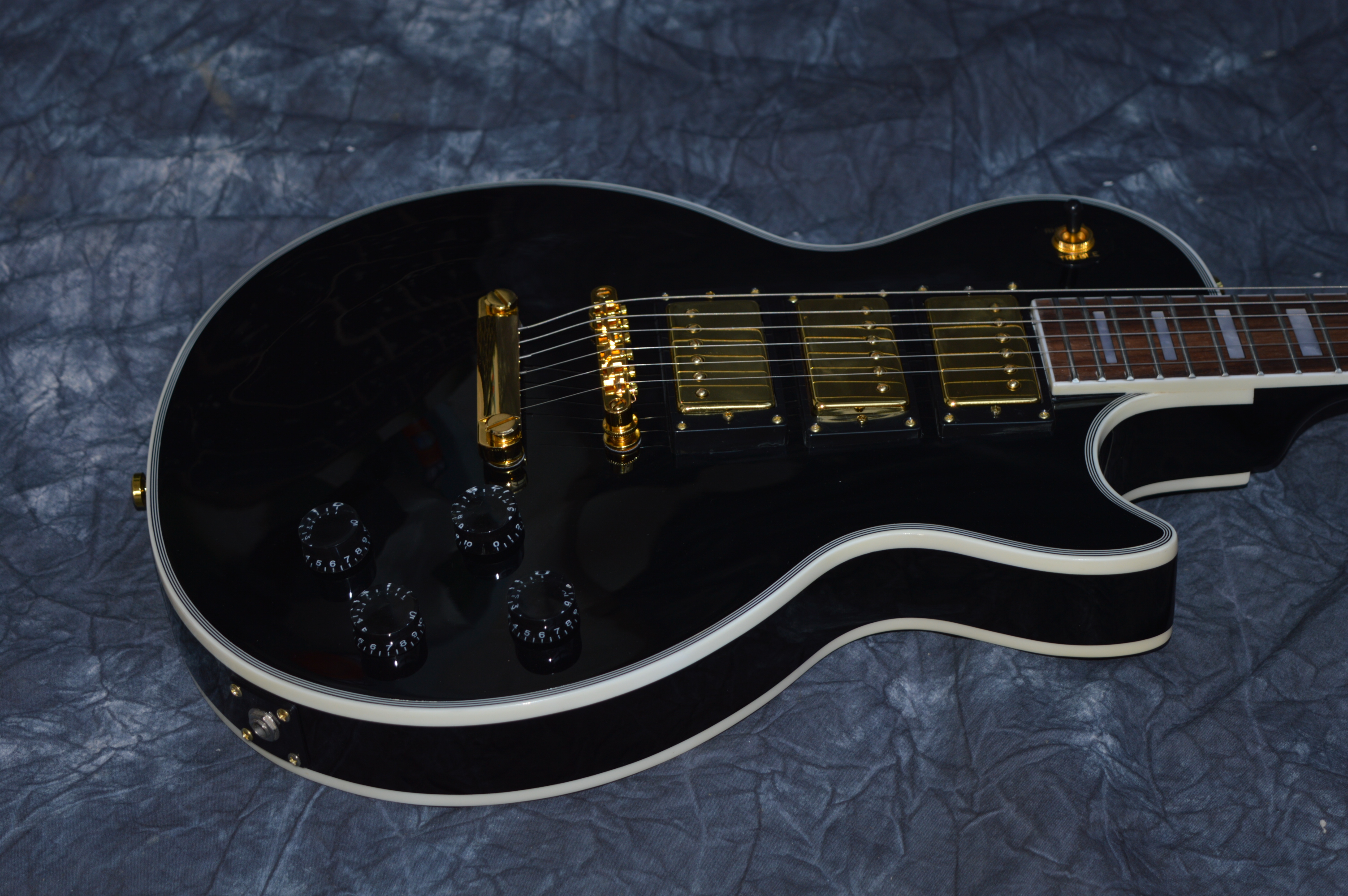 

China electric guitar OEM shop electric guitar ,black guitar white binding Three pickup Free shipping