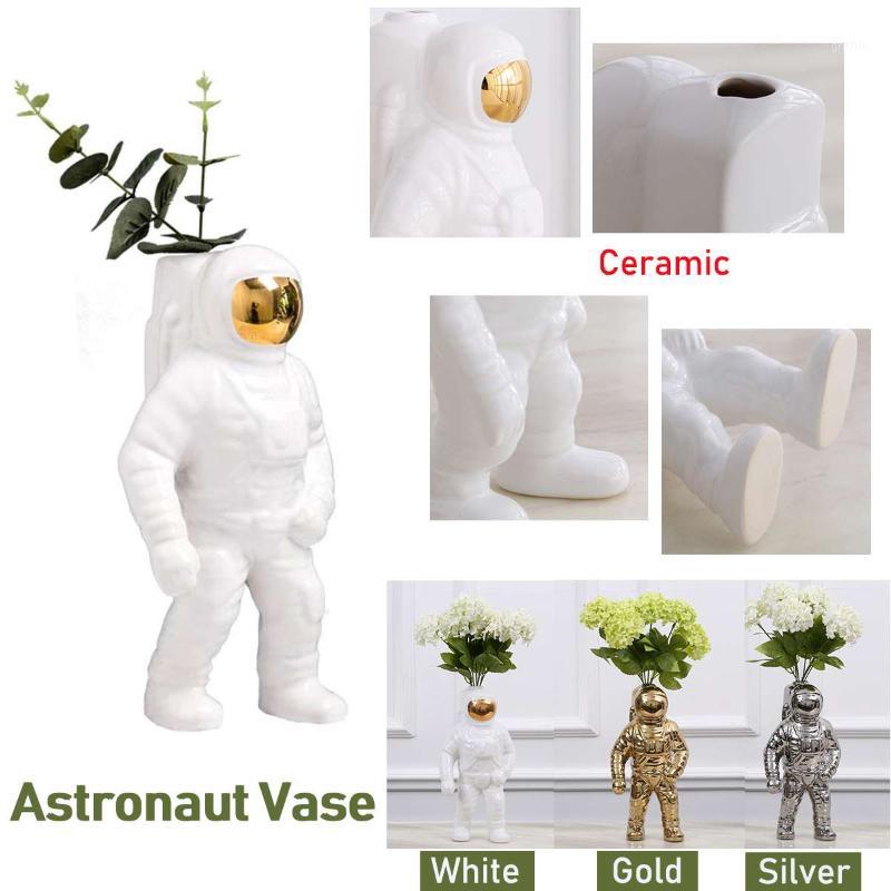 

Space Man Sculpture Astronaut Fashion Vase Rocket Aircraft Ornament Model Ceramic Material Cosmonaut Statue Shuttle Desk Decor1