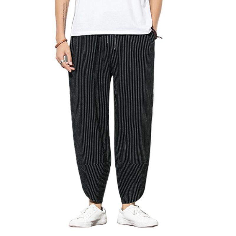 Pantalones de tela a rayas negro-azul