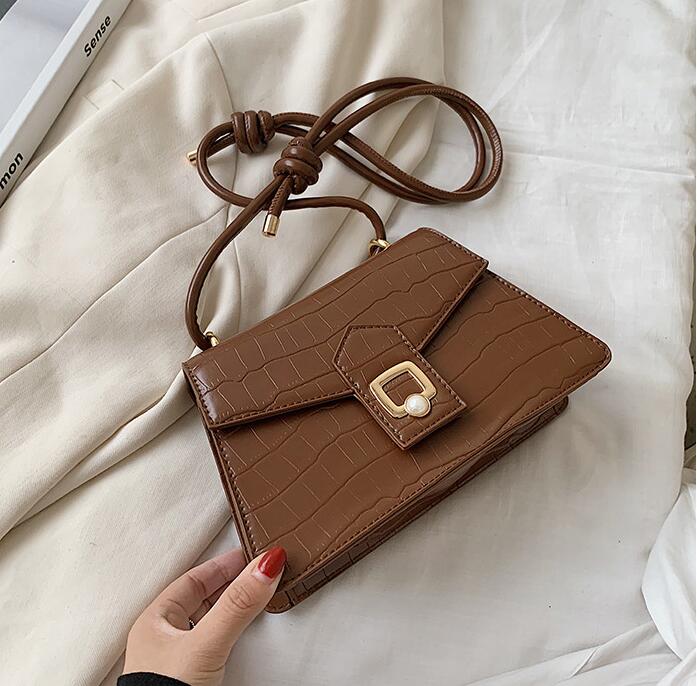 

Factory wholesale women handbag simple embossed Stone women shoulder bag sweet little fresh Pearl Messenger bag leather fashion bag, Black;red