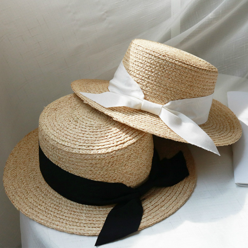 

New simple Women Summer Beach Raffia Black White Ribbon Hat Bow Temperament Flat top Straw Hats Women's Sea Beach Hat