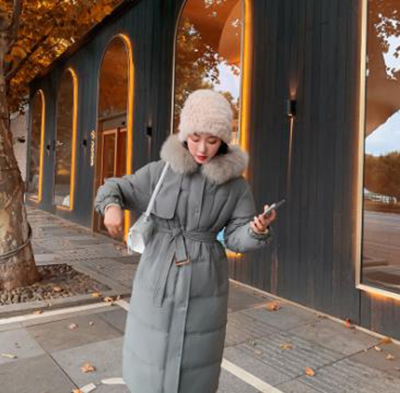 

Wholesale winter women's large fur collar long section over the knee belt thickened loose thin warm cotton jacket, Light gray