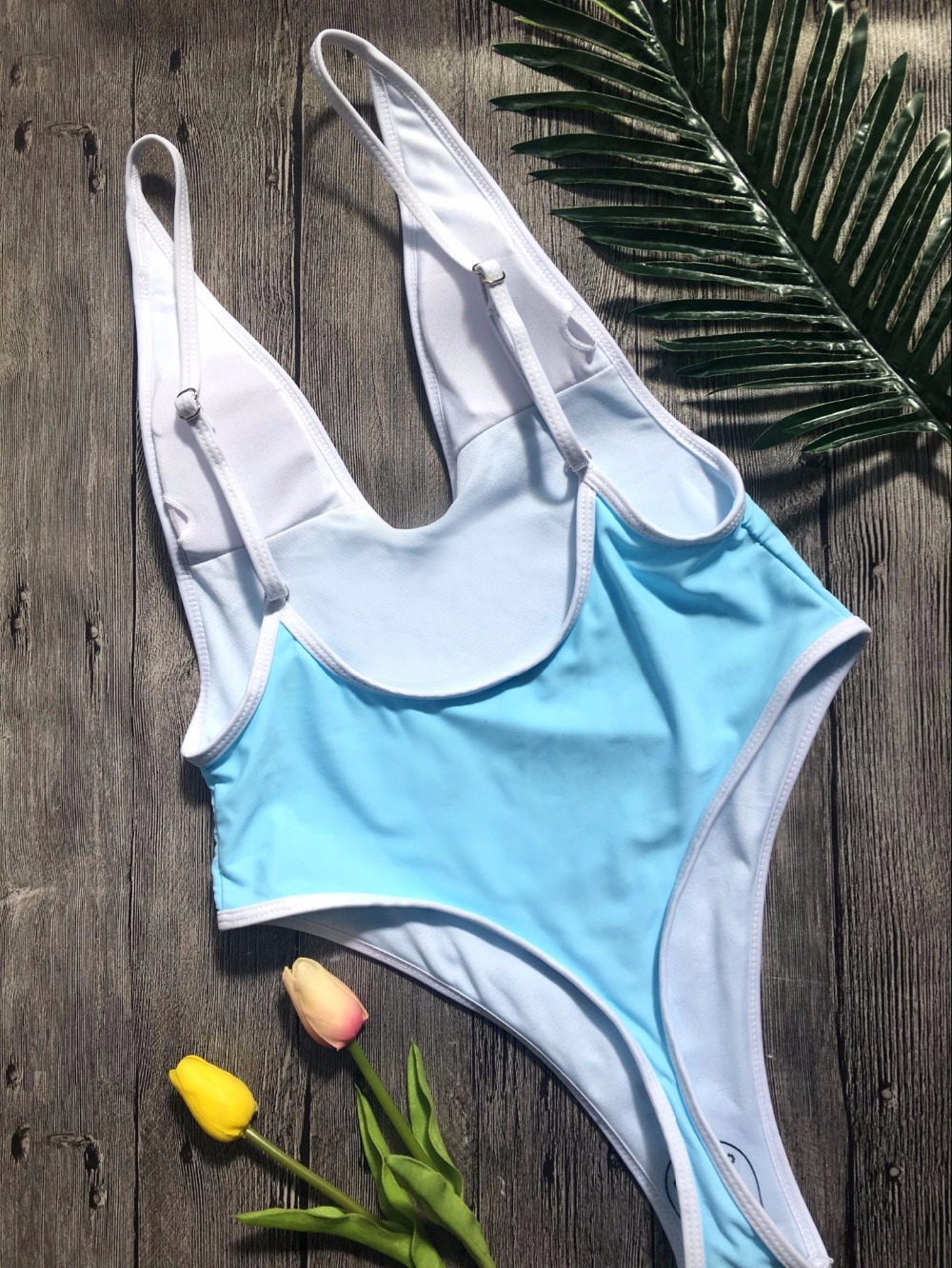 Wholesale Stylish And Cheap Colour Padded Deep V One Piece Swimsuit