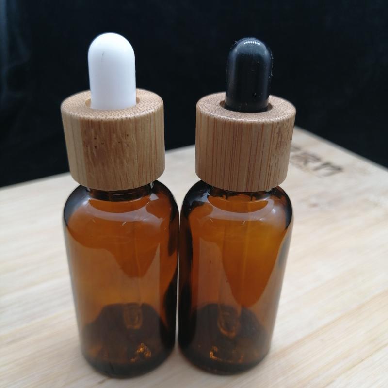 

50pcs amber essential oil glass pipette bottle with eco-friendly bamboo lid wood cap dropper cosmetic container 5/1015/20/30ml