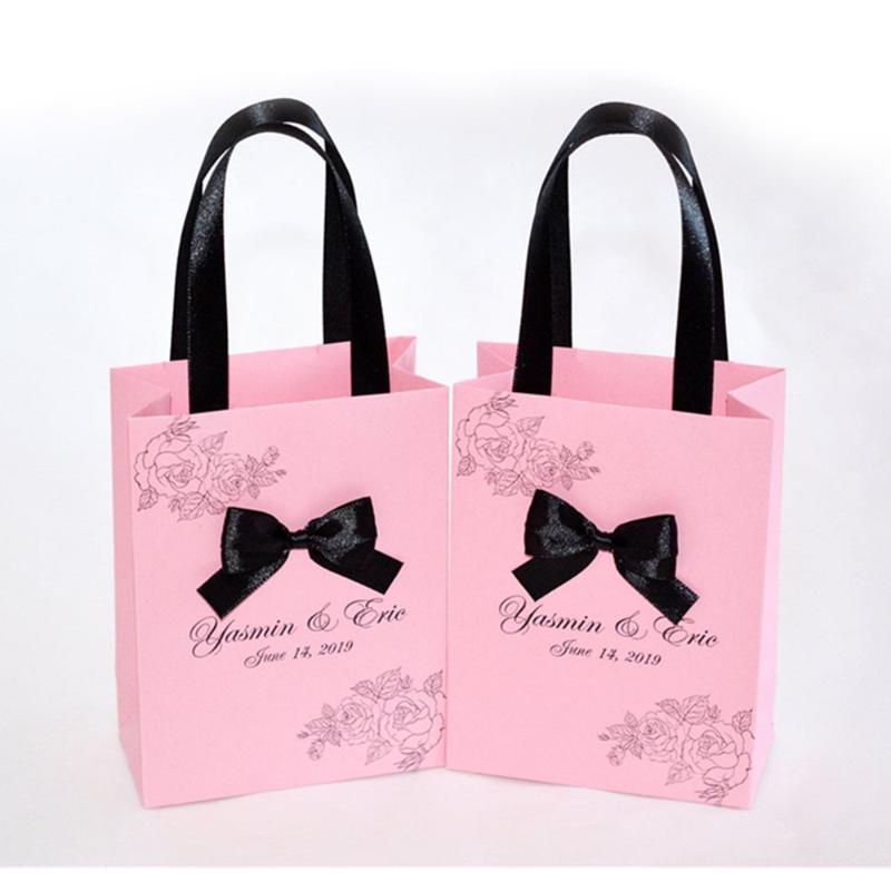 

Personalized Wedding Welcome bags with satin ribbon bow and names, Elegant Light Pink cutom wedding party favor for guests
