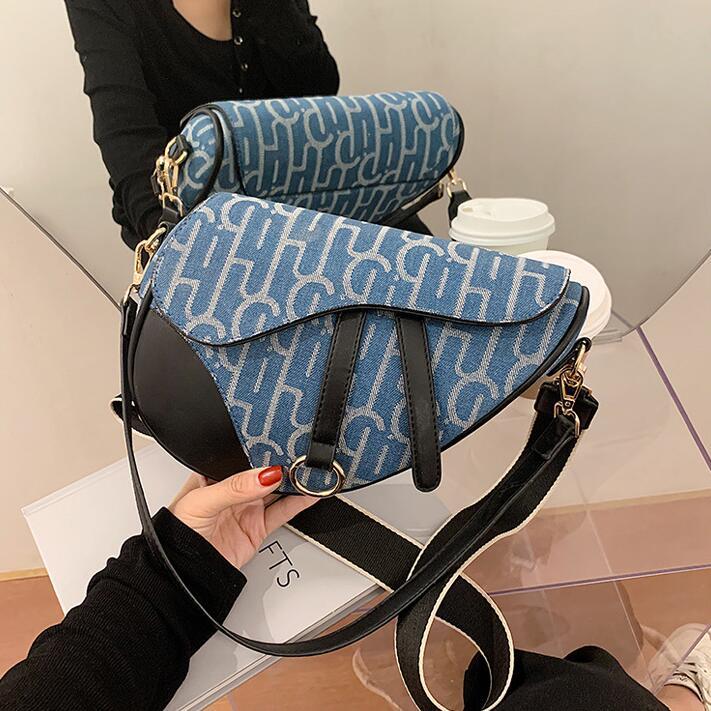 

Factory women handbag street trend printed canvas shoulder bag new contrast leather shoulder messenger bag flip printed leather fashion bag, Black;red