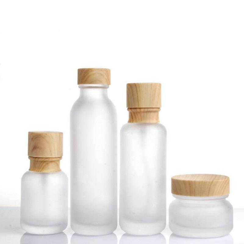 

Frosted Glass Jar Lotion Cream Bottles Round Cosmetic Jars Hand Face Lotion Pump Bottle with wood grain cap Bottles Round Cosmeti EWD997
