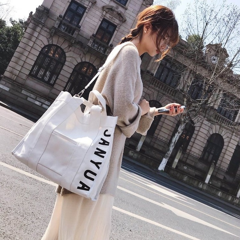 

2020 new Korean simple wild canvas bag female shoulder messenger bag art student handbag female, Black