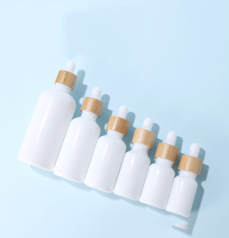 

10ml 15ml 20ml 30ml 50ml 100ml White Porcelain Empty Cosmetic Glass Dropper Bottles Serum Bottle With Bamboo Cap