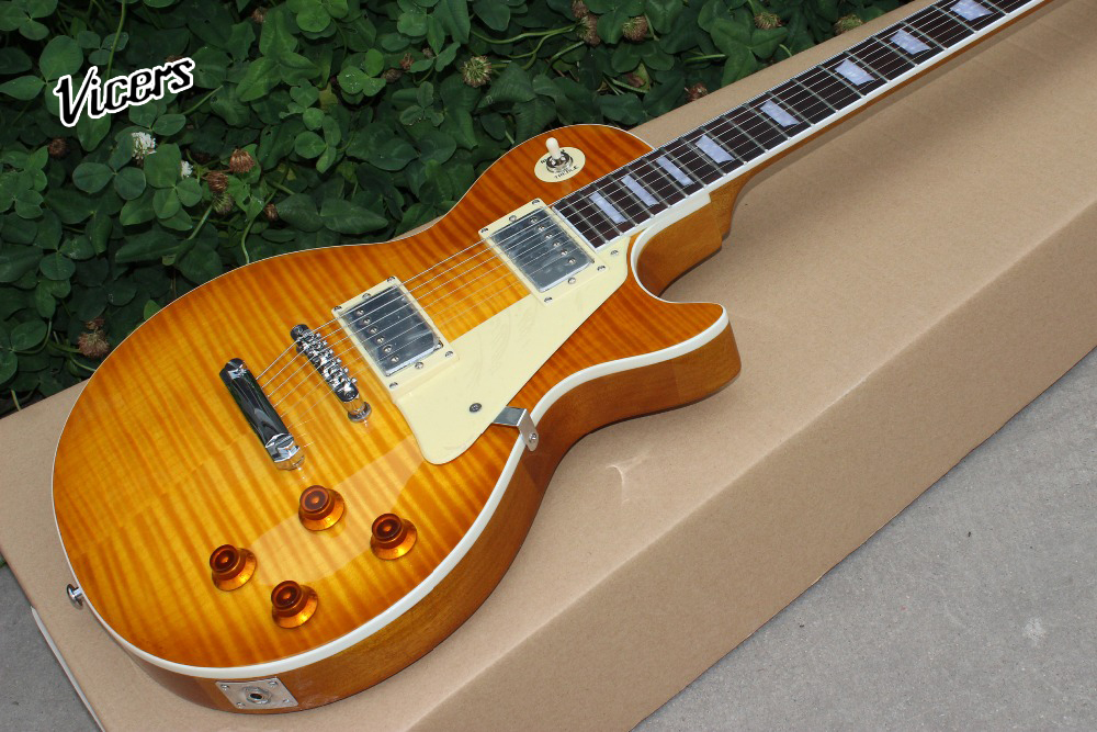 

Custom shop ,59 R9 electric guitar, orange color tiger flame top gitaar,one piece neck and body guitarra.,support customization