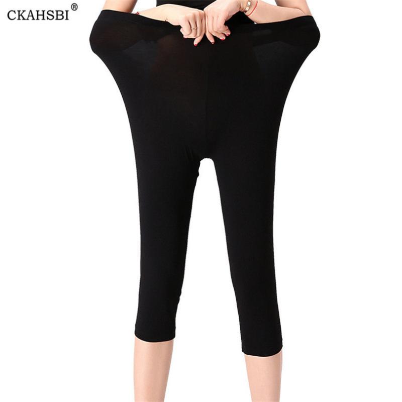 

CKAHSBI Hot Sale Solid Sexy Shiny Black Elastic Womens High Waist Stretch Shiny Leggings Candy Color Pants Large S-7XL Capris, Qy06 white