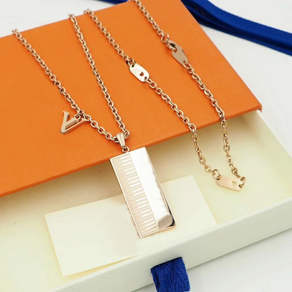 

Europe America Style Men Lady Women Lovers Long Chain Necklace With Engraved V Initials Sound Keyboard Pendants