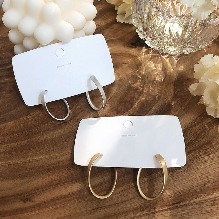 

Cold wind simple temperament wild matte texture twisted metal earrings