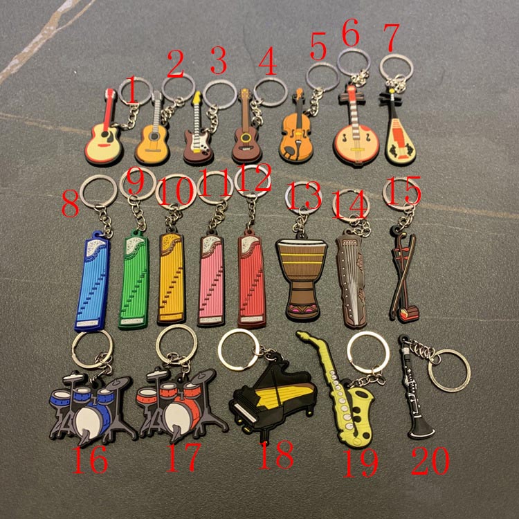 

New retro musical instrument silicone guzheng keychain guitar pvc keychain customized cartoon small gift keychain pendant