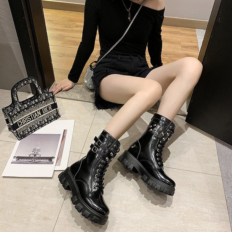 women wearing white boots