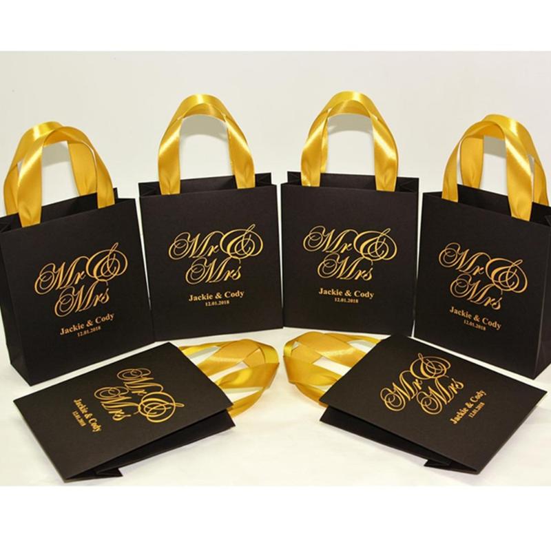 

Personalized Mr & Mrs Wedding Welcome Bags with satin ribbon and names, Elegant Black and Gold Wedding Party favors for guests