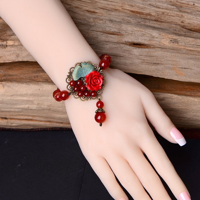 

Personal Retro Cinnabar Flower Smear Green Alloy Bracelets Hand Knitted Temperamental Red Manao Charm Bracelets