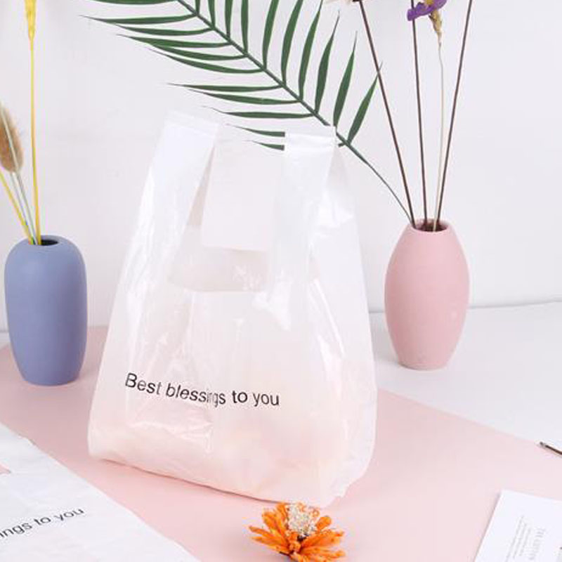 

50pcs/Lot New Supermarket Plastic Bags Handle Fruit Bread Cake Shopping Bag Packaging Carry Out Bags