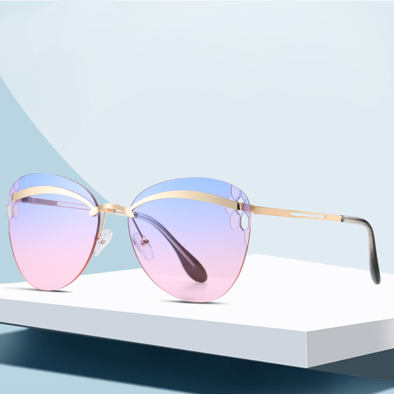 

2020 new frameless fashion polarized sunglasses cut edge sunglasses female round diamond frame ocean glasses