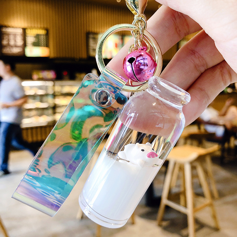 

Floating Creative cute pig acrylic milk bottle Keychain Moving Liquid quicksand drift bottle keyring for women bag pendant