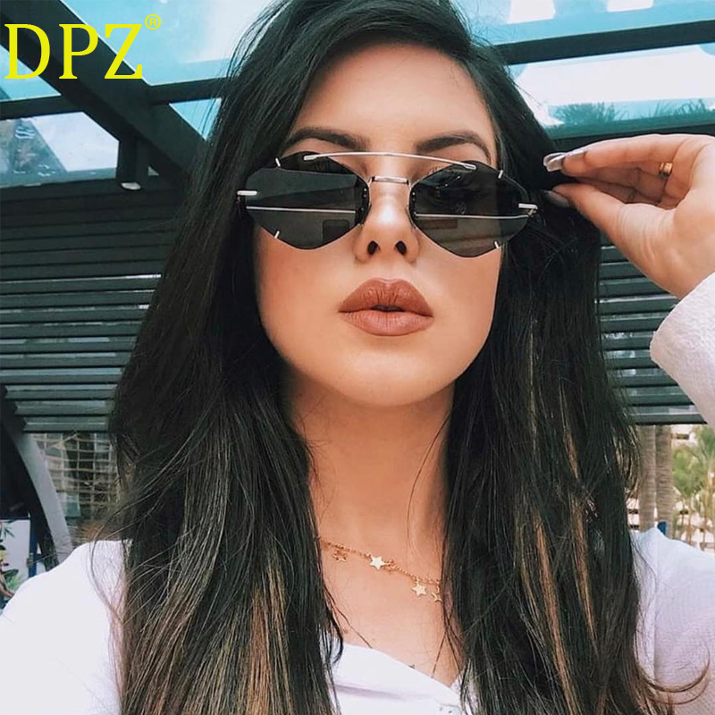 

2020 New personality frameless polygon sunglasses ultra light punk men and women street shooting trend sunglasses