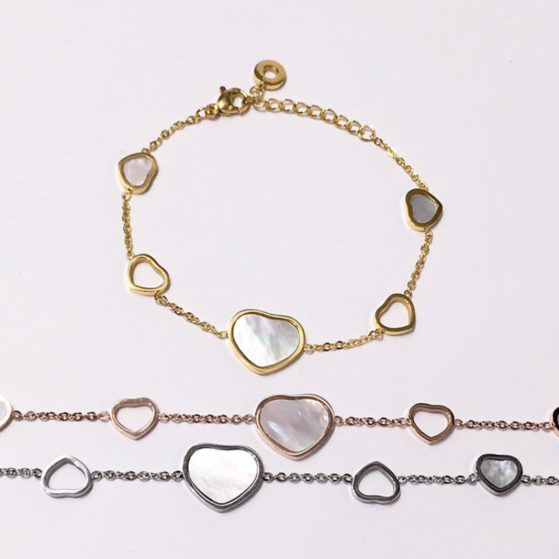 

Beautiful Heart-shaped White Shell Hollow Love Irregular Titanium Bracelet