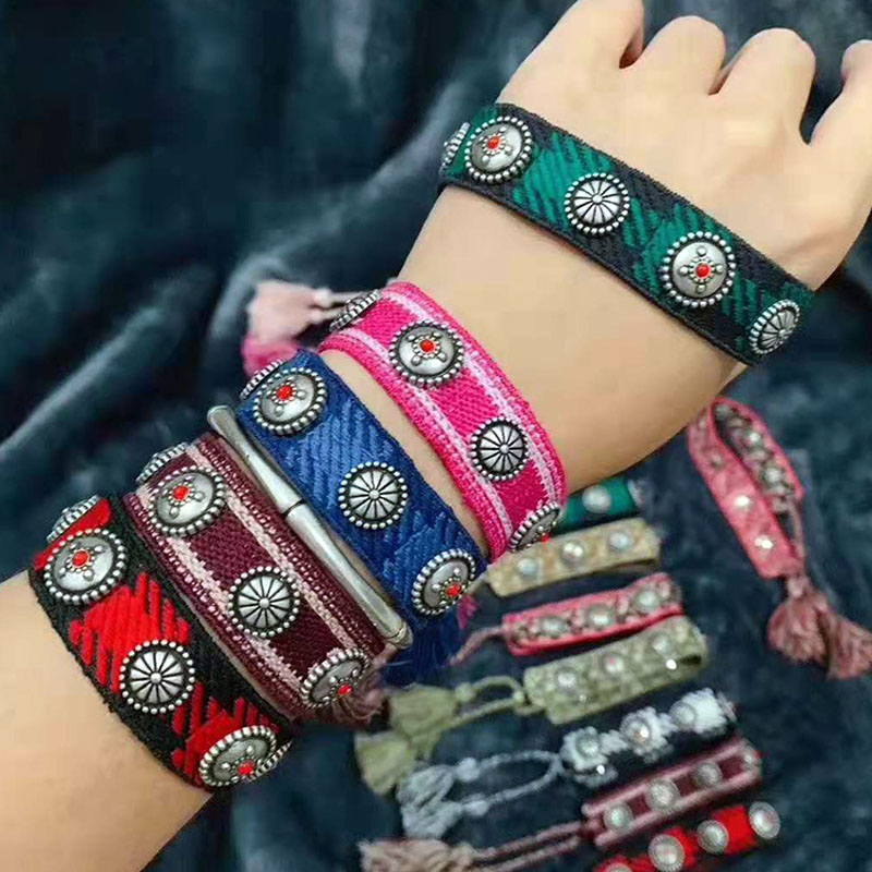 

Zlxgirl high quality fashion Mixed-colour cotton yarn braided rivet pull-out Bracelet suitable for male and female