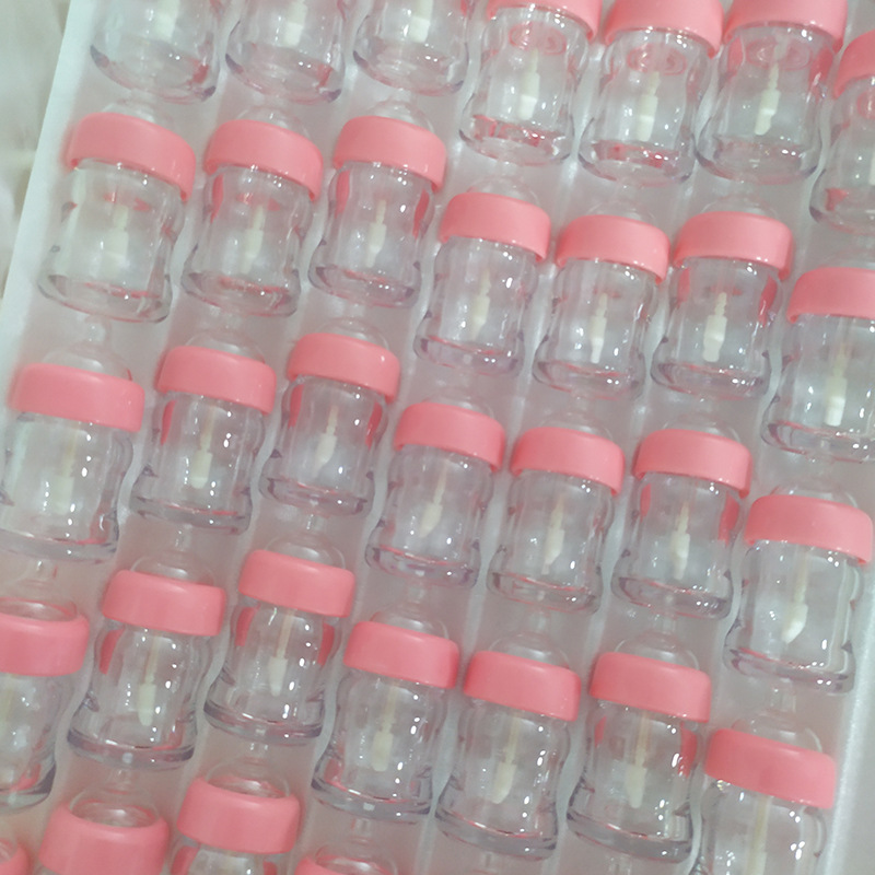 

Wholesale Cosmetic Lip Gloss Packaging Container 6ml Milk Bottlel Plastic Empty Lipgloss Tubes Nipple Lip Gloss Tube Packaging