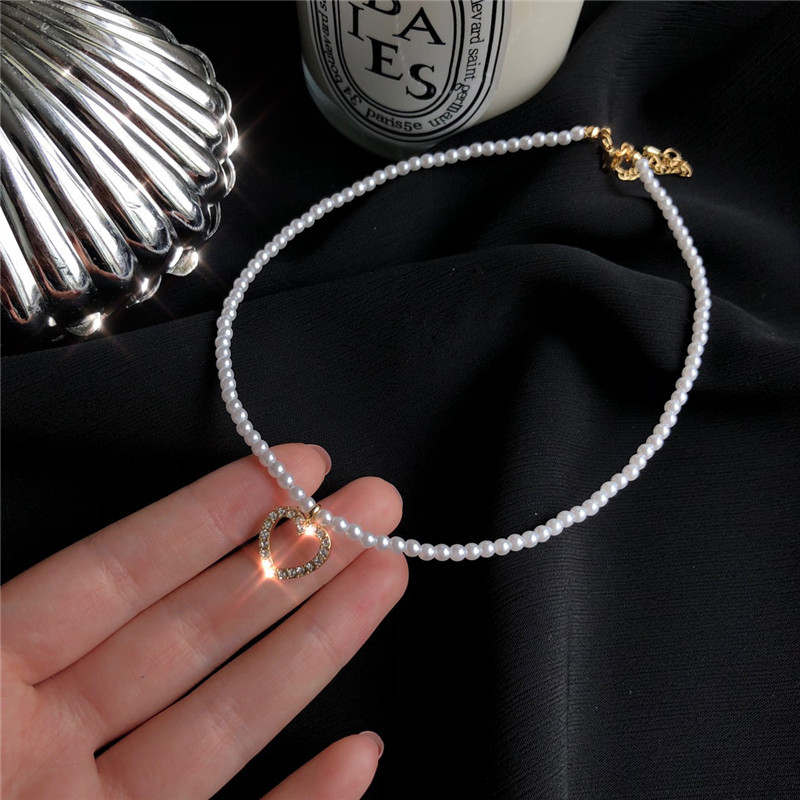 

Luokey Elegant Simple Simulated Pearl Choker Collar Beads Chain Crystal Heart Necklace For Women Minimalist Jewelry Wholesale