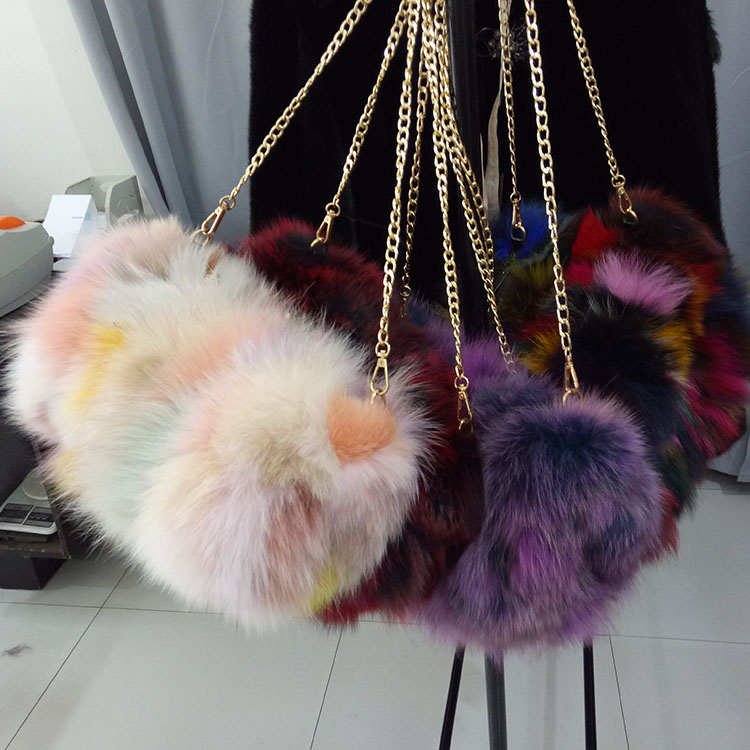 

2020 new Korean version of the fur fur gloves bag female oblique cross hair hand warm hair drum shoulder bag genuine ch